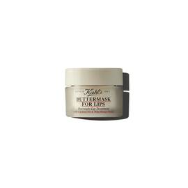 Donuk bir kavanoz ve acık renkli bir kapaktan oluşan bir grafik, uzerinde "Kiehl's BUTTERMASK FOR LIPS" etiketiyle.