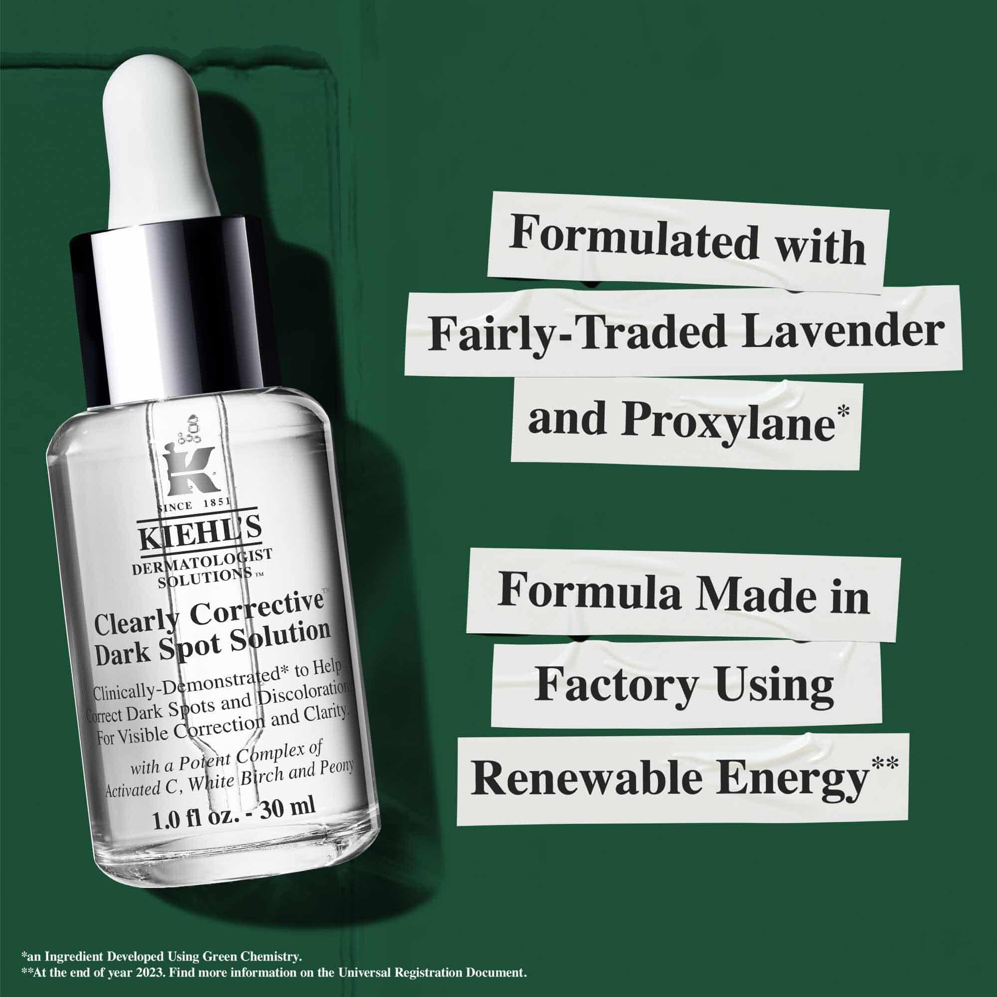 Bottle of Clearly Corrective Dark Spot Solution with sustainability claims regarding renewable energy and recycled glass.