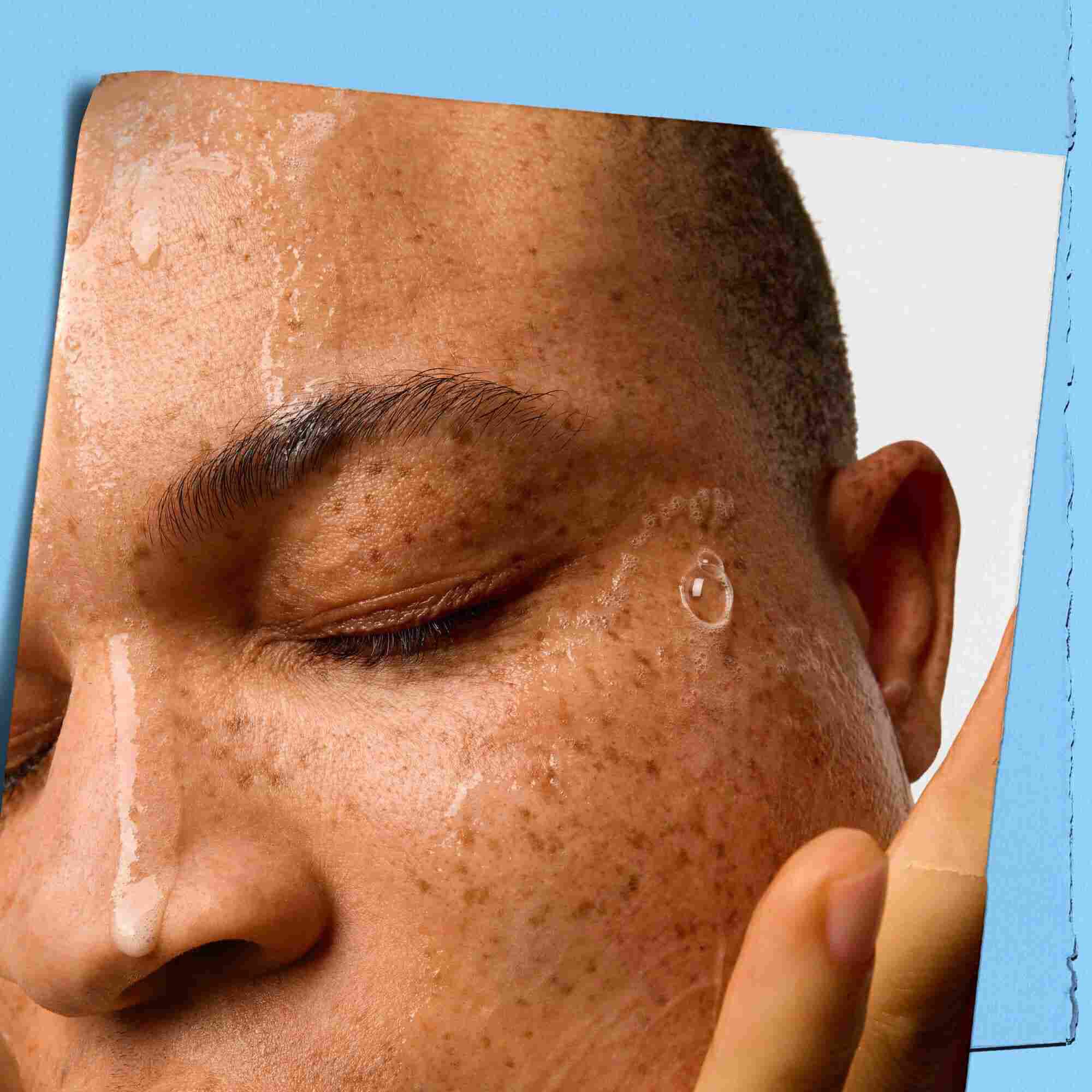 Model with Kiehl's Ultra Facial Cleanser on their face