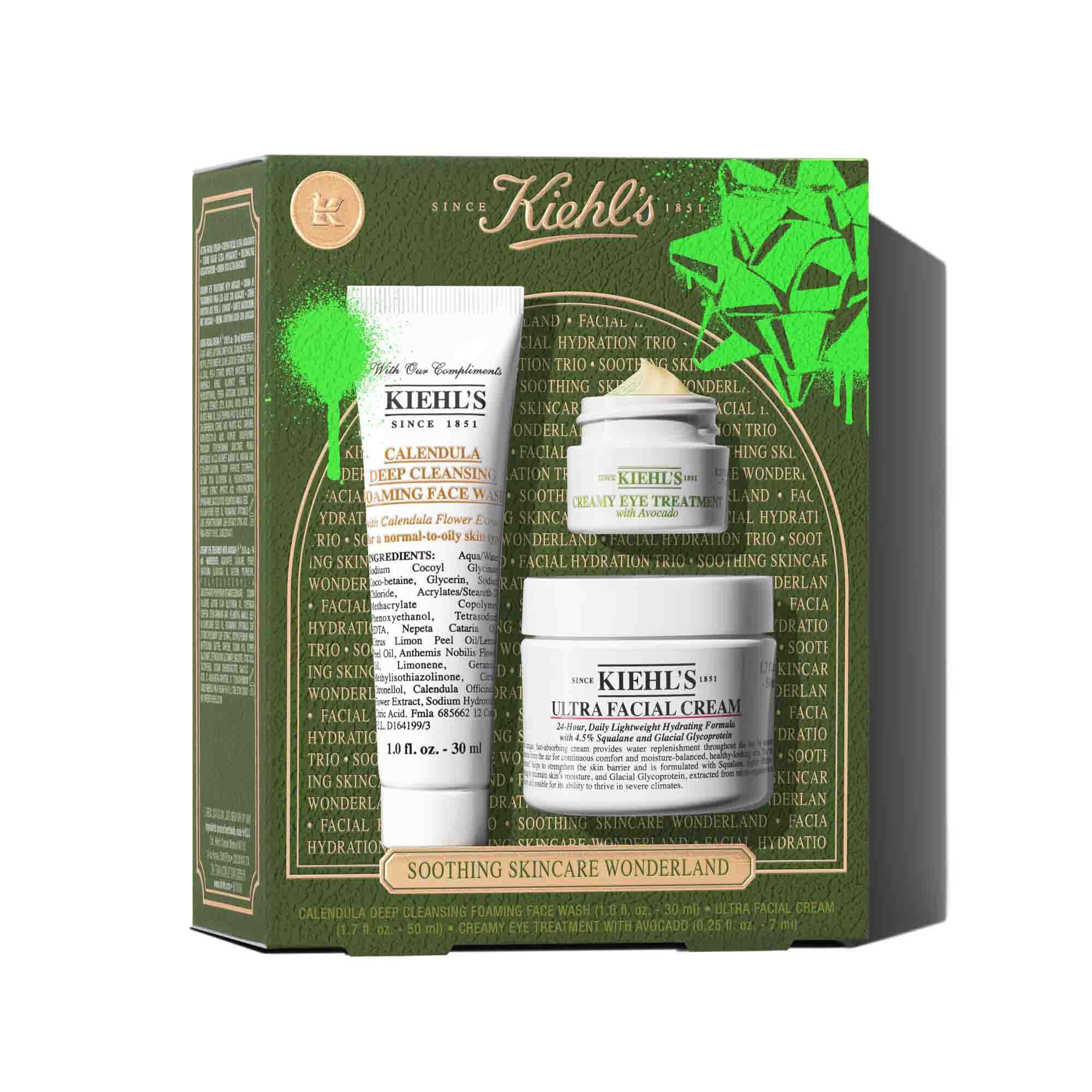 Uc Kiehl’s cilt bakım urununden oluşan bir grup beyaz bir arka plan uzerinde sergileniyor: bir tup icindeki Calendula Deep Cleansing Foaming Face Wash, kucuk bir kavanozdaki Creamy Eye Treatment with Avocado ve daha buyuk bir kavanozdaki Ultra Facial Cream.