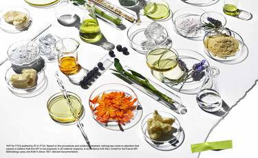 Petri dishes with botanical ingredients like calendula and ginger, illustrating Kiehl’s blend of nature and science in skincare formulations.