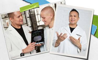 Kiehl’s skincare expert gesturing towards a professional skin analysis session, featuring a customer using a high-tech diagnostic device with another expert in the background.