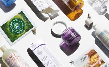 Flat lay of Kiehl’s products, including Super Multi-Corrective Cream and Amino Acid Shampoo, with "Mission Renewal" cards highlighting the brand's sustainability and environmental initiatives.